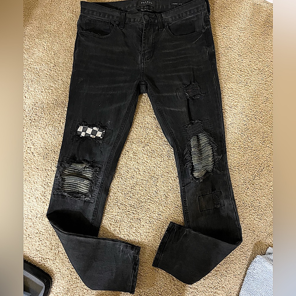 Pacsun black jeans with distressed and army , checkered patterned holes .Size 32
